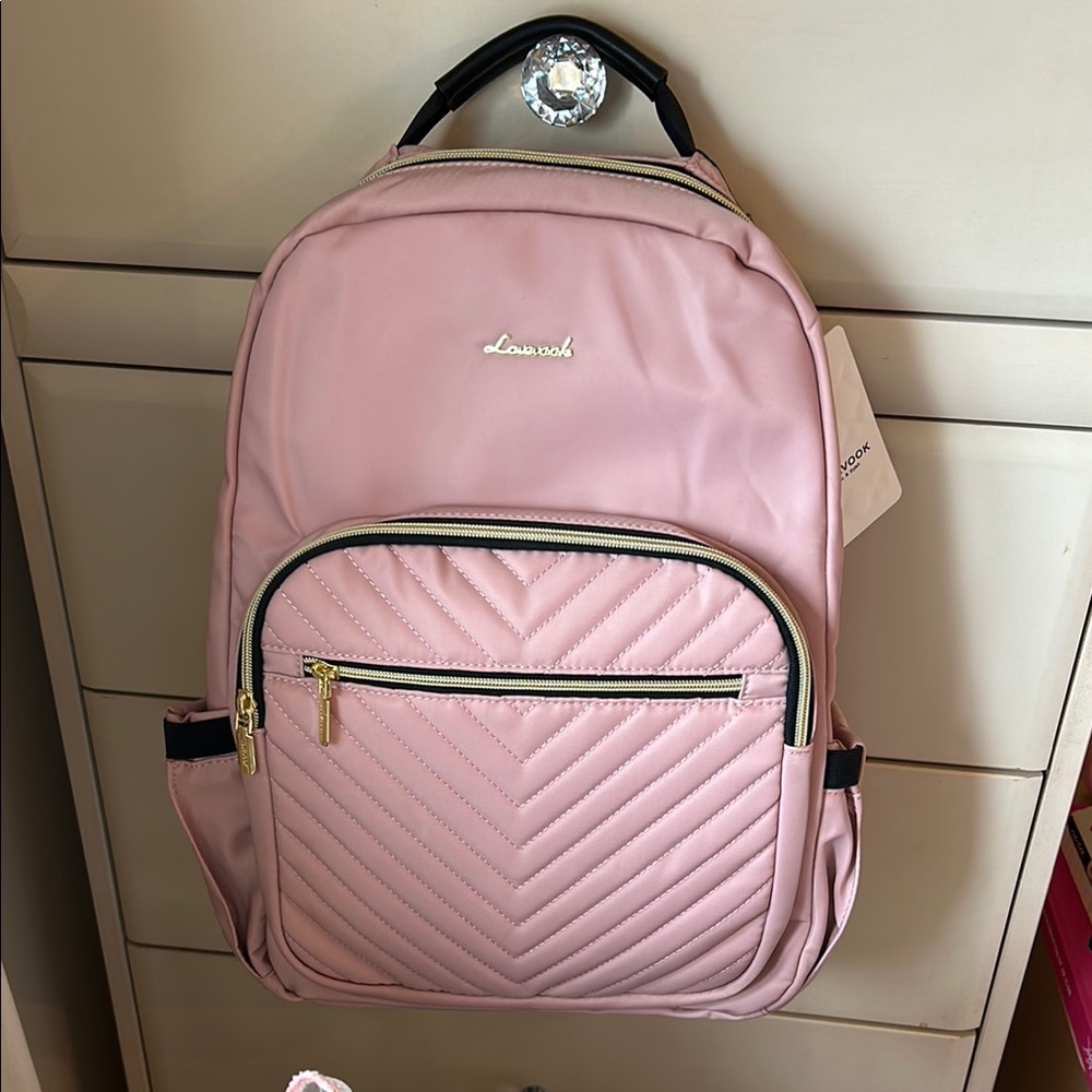 Pink Backpack with USB charger, laptop and tissue dispenser pocket
